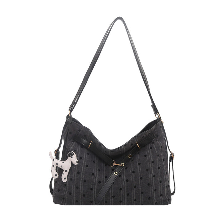 Stylische Schultertasche mit Tierakzenten