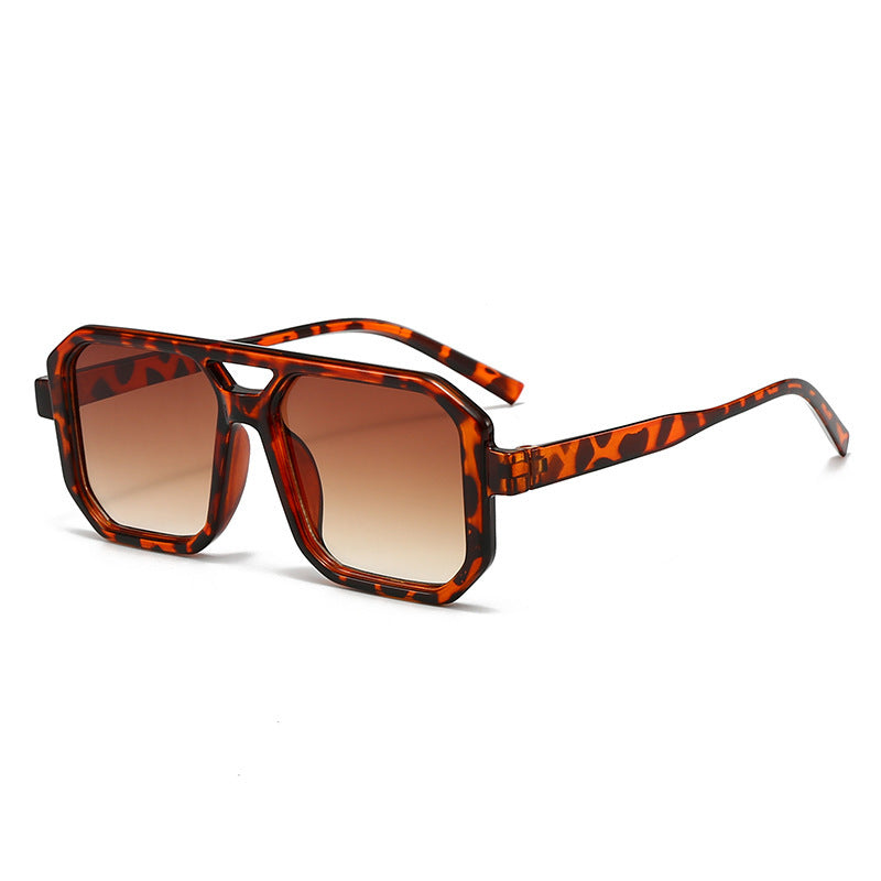 Damen Geometrische Sonnenbrille mit stylischem Muster Karnz