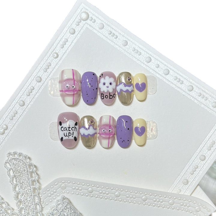 Verspieltes, cartoon-themed Press-On Nail Art Set Karnz