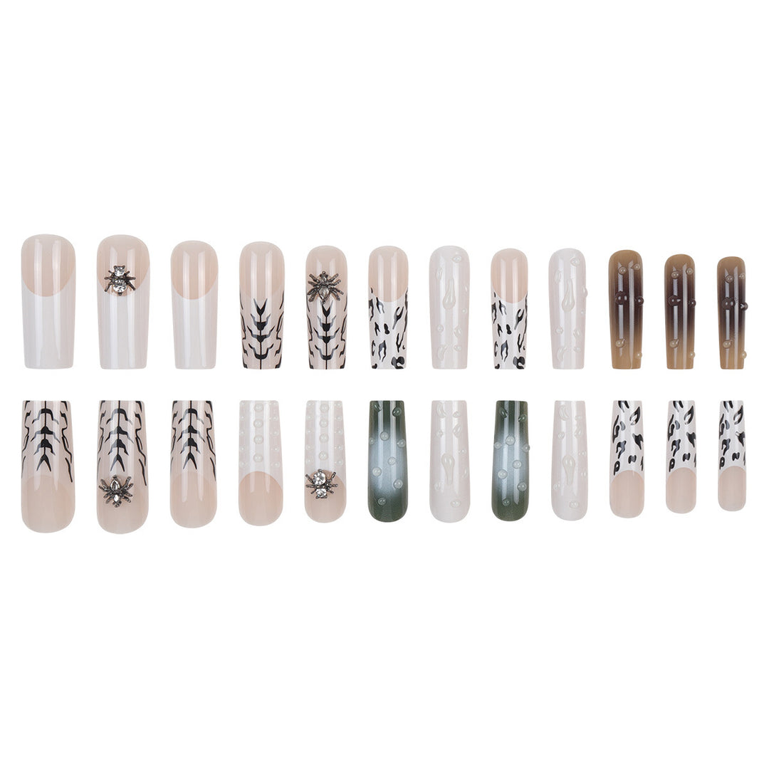 Künstlerisches Langes Stiletto Press-On Nagelset mit einzigartigen Mustern Karnz