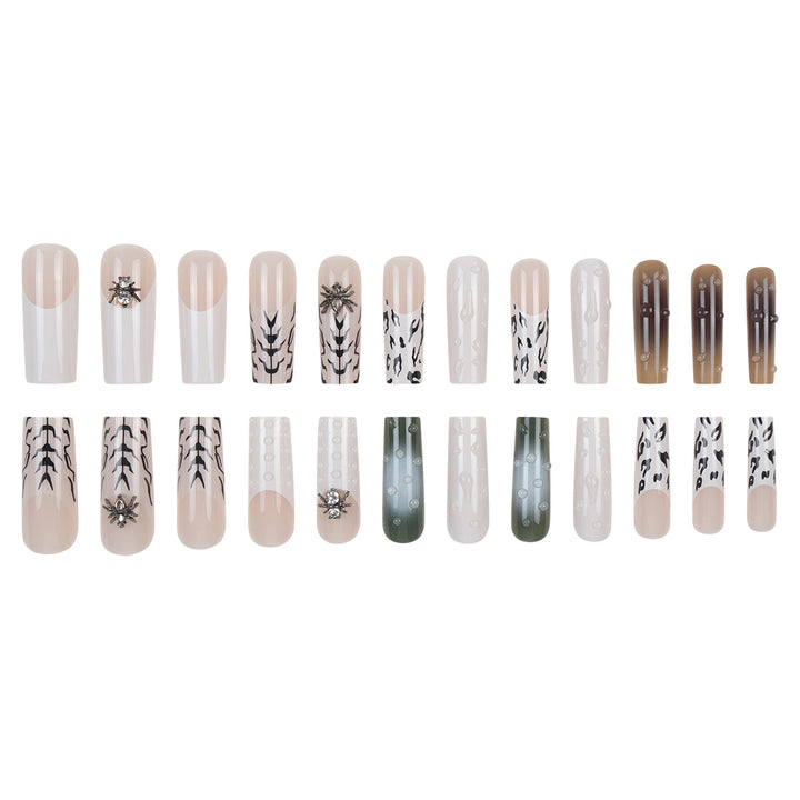 Künstlerisches Langes Stiletto Press-On Nagelset mit einzigartigen Mustern Karnz
