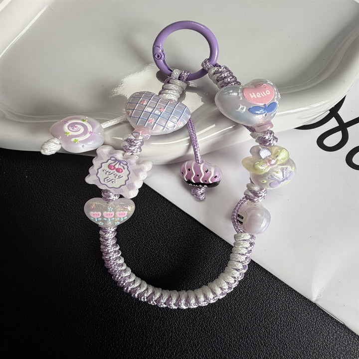 Verspielte Perlencharme-Handyband Karnz 1790134944