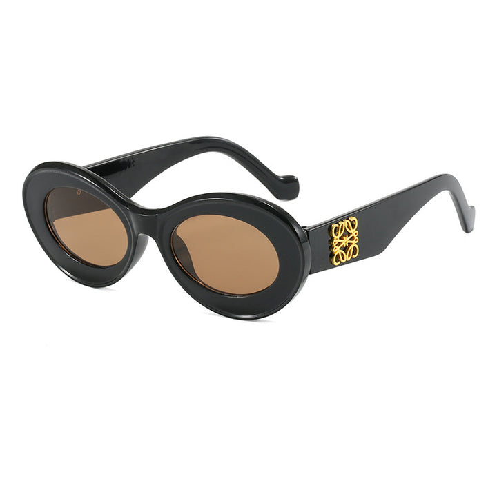 Damen modische Sonnenbrille mit ovalem Rahmen und goldenen Applikationen Karnz