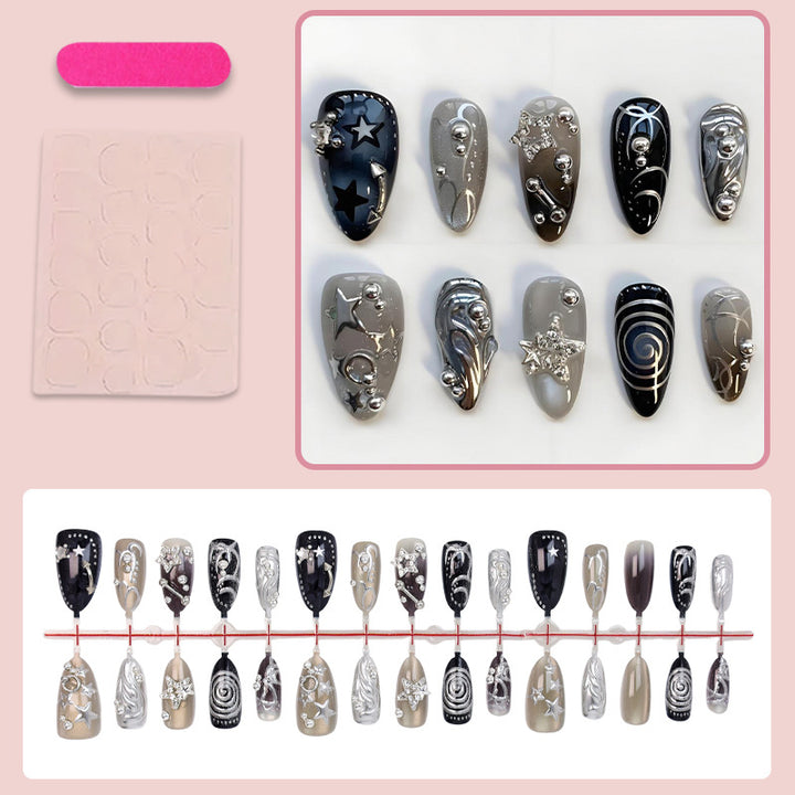 Kunstnageldesign Set mit glamourösen Sternen- und Metallic-Akzenten Karnz