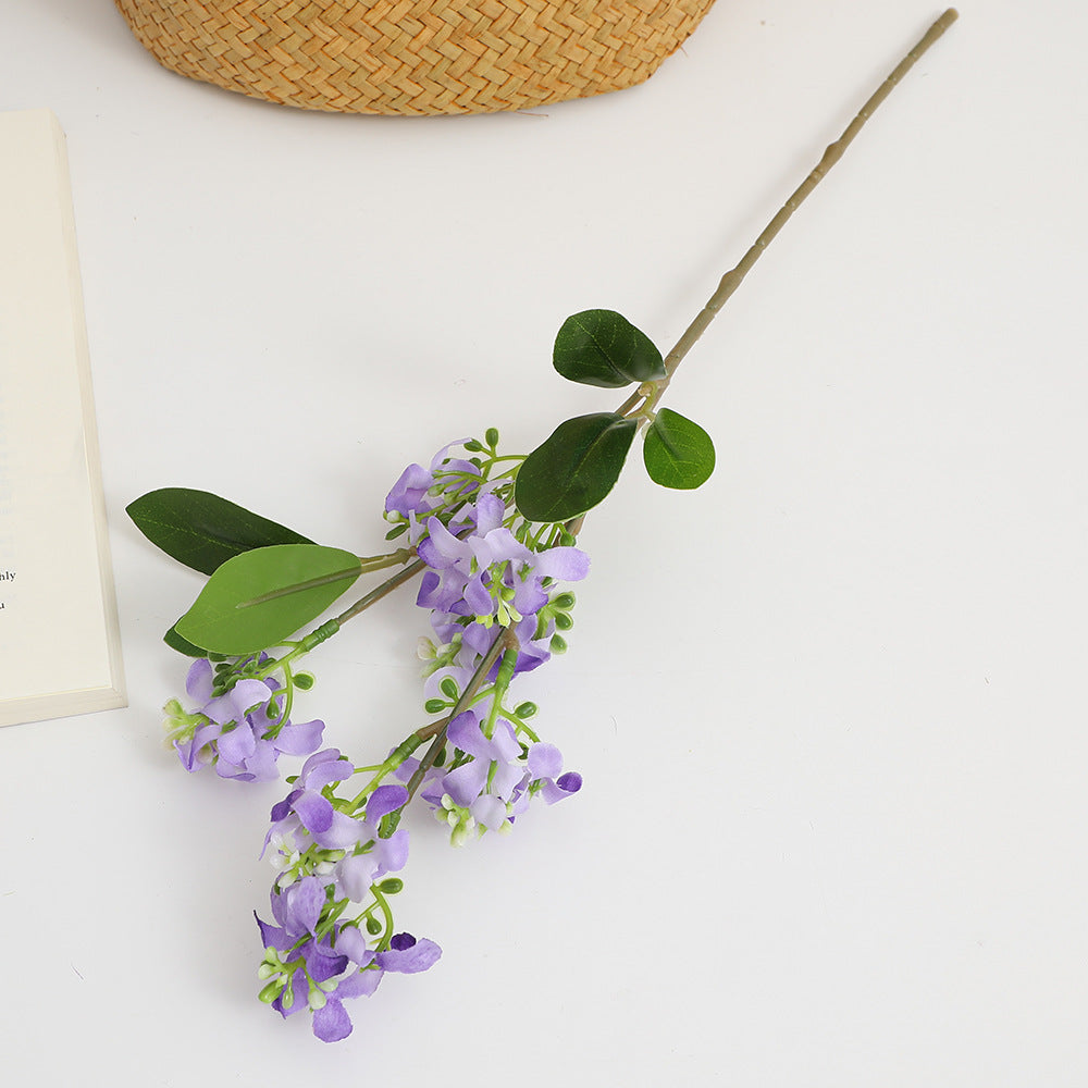 Künstlicher Blütenzweig mit leuchtenden Blüten Karnz