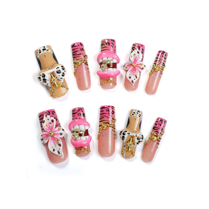 Kreatives Nagelset mit elegantem Tier- und Blütenmuster Karnz