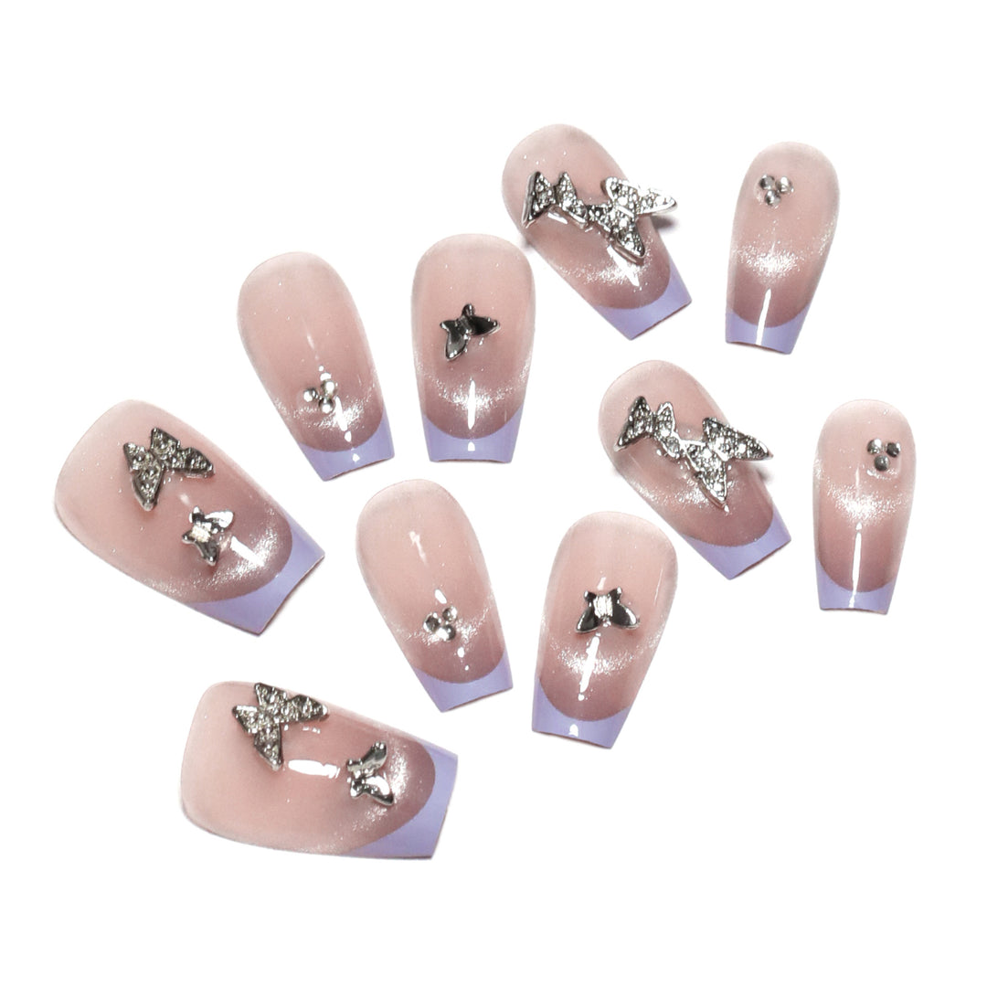 Künstliche Nagelverlängerungen mit Glitzerdesign und edlen Akzenten Karnz