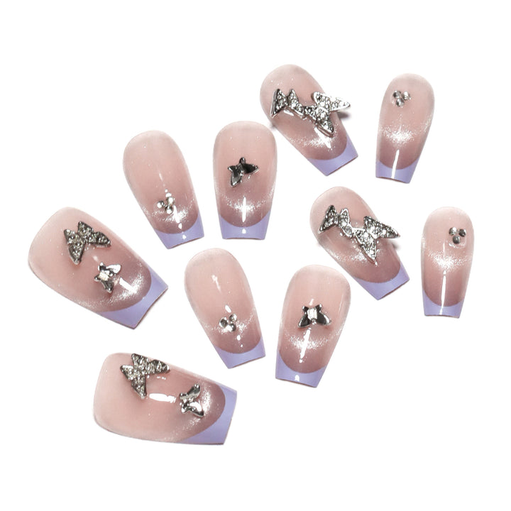Künstliche Nagelverlängerungen mit Glitzerdesign und edlen Akzenten Karnz