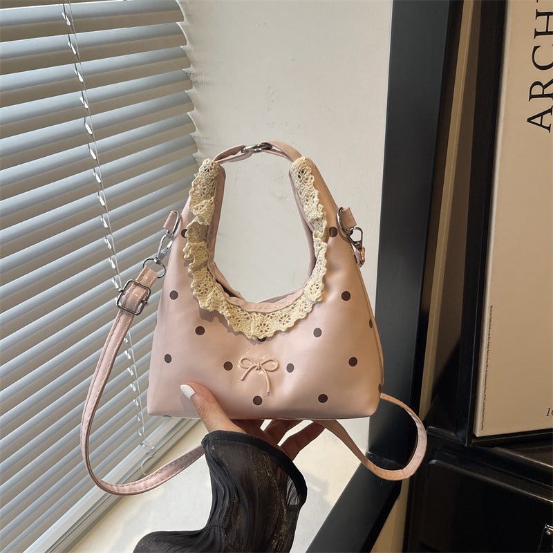 Dekorativer Handtasche mit Spitzenrand und Punkte-Muster