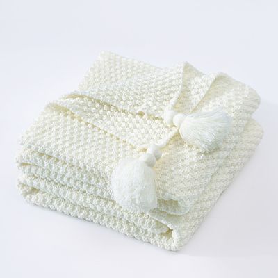 Strukturierte Strickwurfdecke