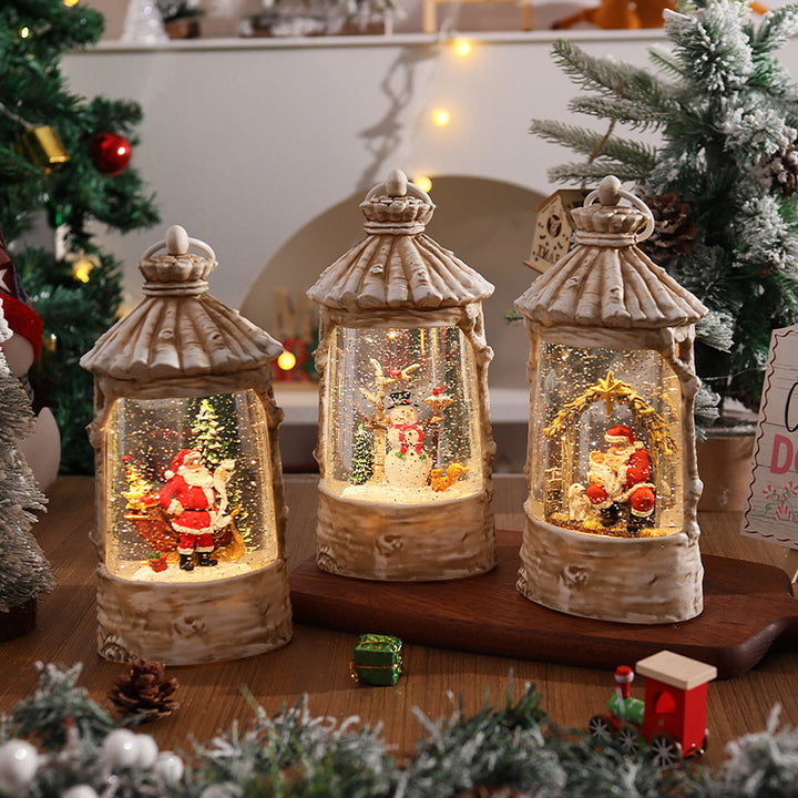 Beleuchtete Weihnachtslaterne mit Schneeszenen Karnz