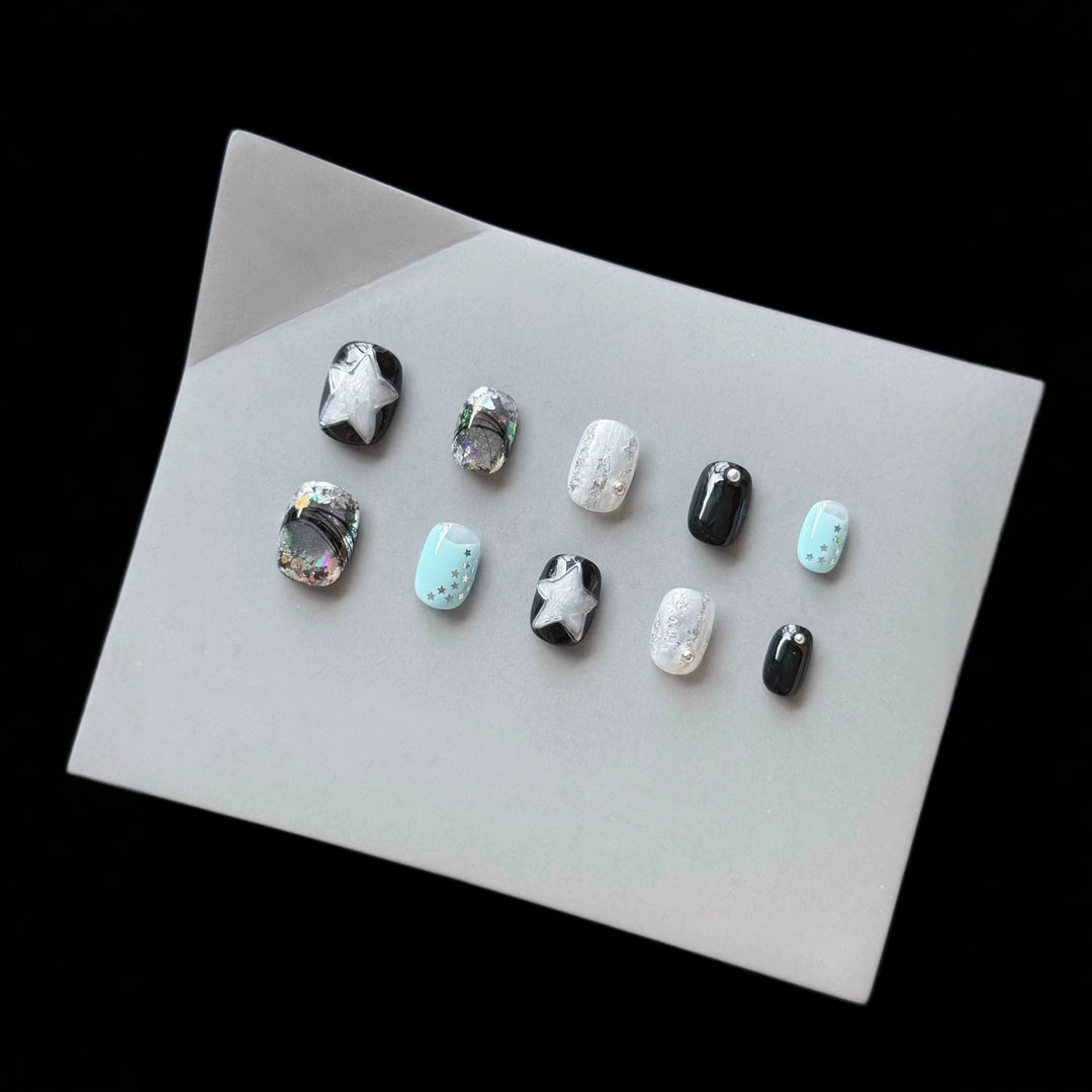 Dekoratives Press-On Nagelkunst-Set mit kosmischem Stern-Thema