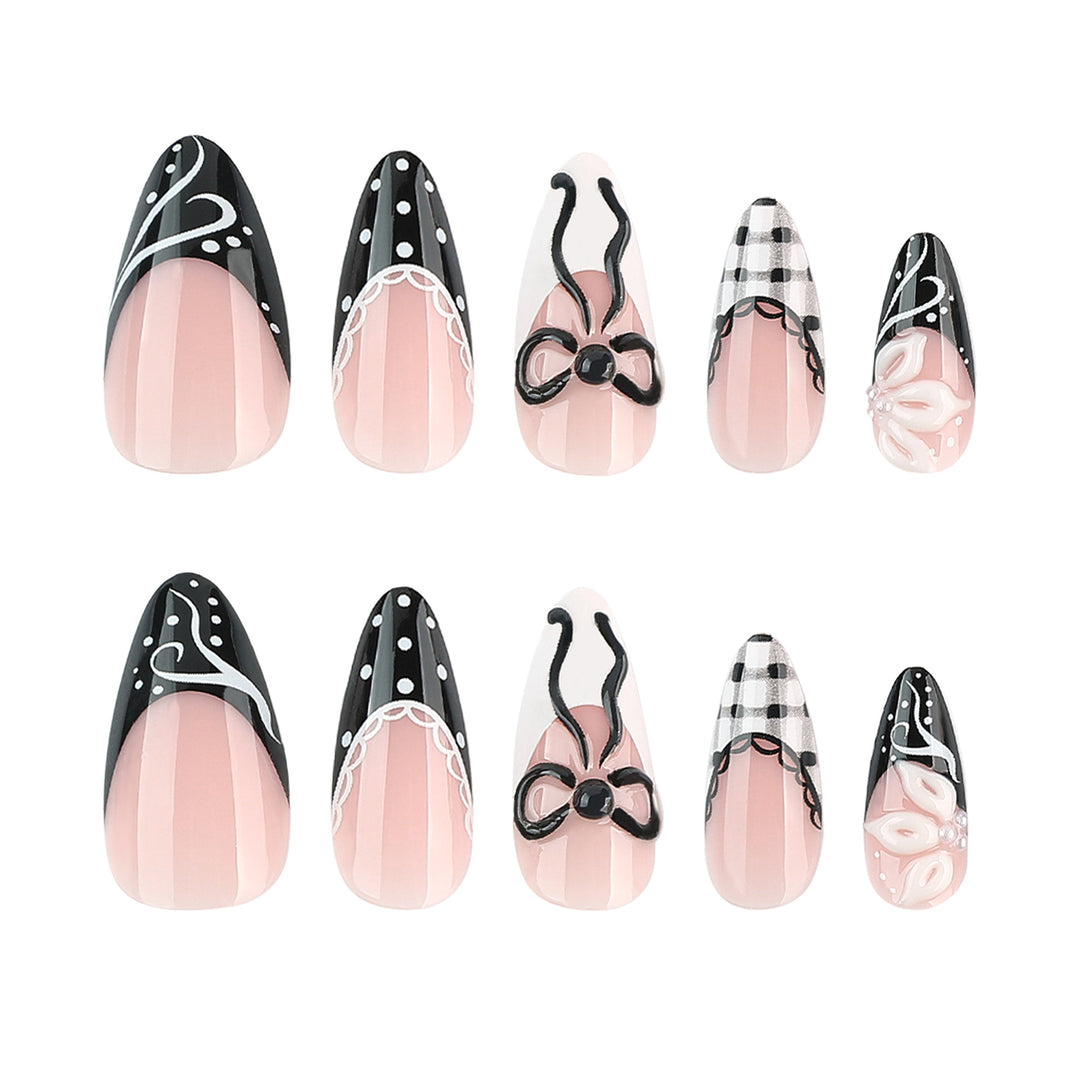 Kunstvolle Stiletto-Nägel mit floralen und geometrischen Akzenten Karnz
