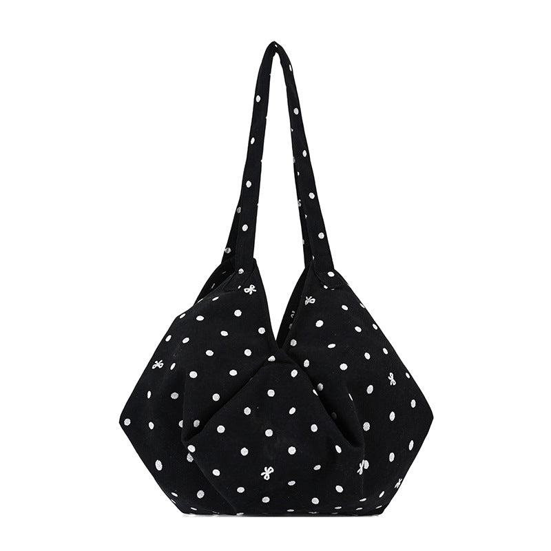 Moderne gepunktete Schultertasche