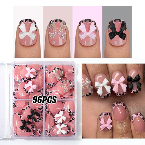 Kunstnagelset mit beeindruckenden Blumen- und Schleifenakzenten Karnz
