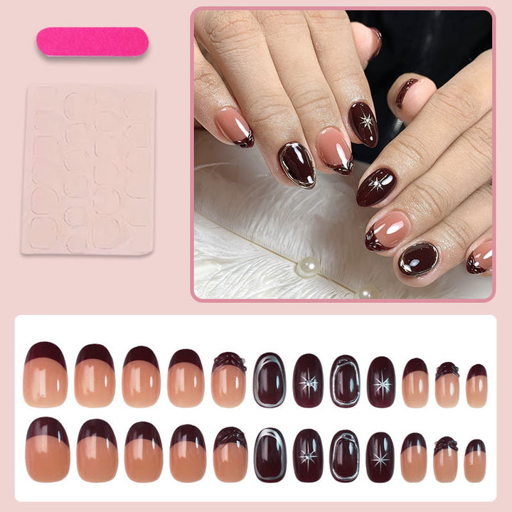 Kunstnagelset mit eleganten Farbverlauf und zarten Verzierungen Karnz
