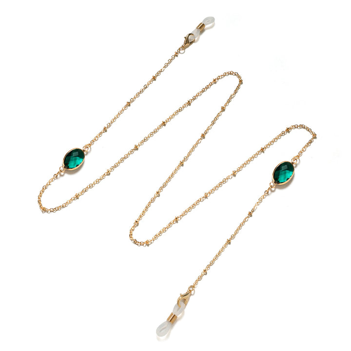 Eleganter mit Edelsteinen verzierter Brillenhalter Karnz