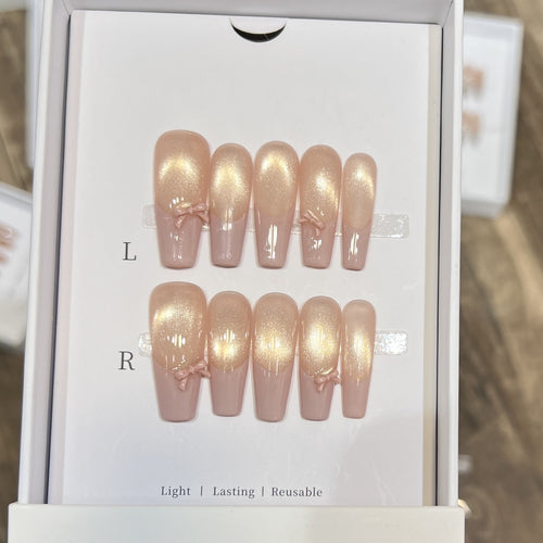 Wiederverwendbares Press-On-Nagelset mit eleganten Schleifenakzenten Karnz