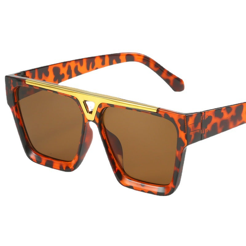 Damen modische oversized Sonnenbrille mit stilvollem goldenen Akzent Karnz