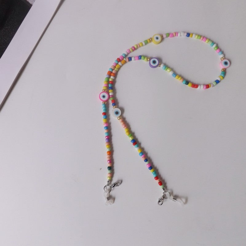 Bunte Brillenhalterkette mit Augenmotiven Karnz