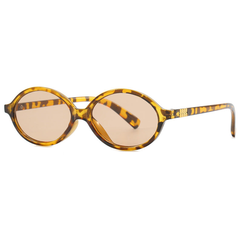 Damen modische Sonnenbrille mit ovalem Rahmen und goldenen Akzenten Karnz