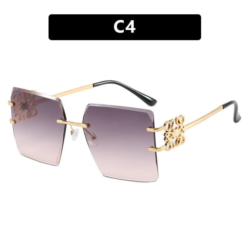 Damen modische Sonnenbrille mit außergewöhnlichem Design und goldenen Akzenten Karnz