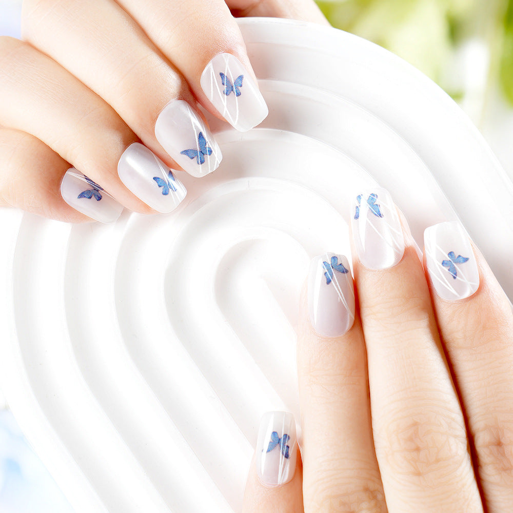 Elegante Schmetterlingsdruck Press-On Nagelset Karnz