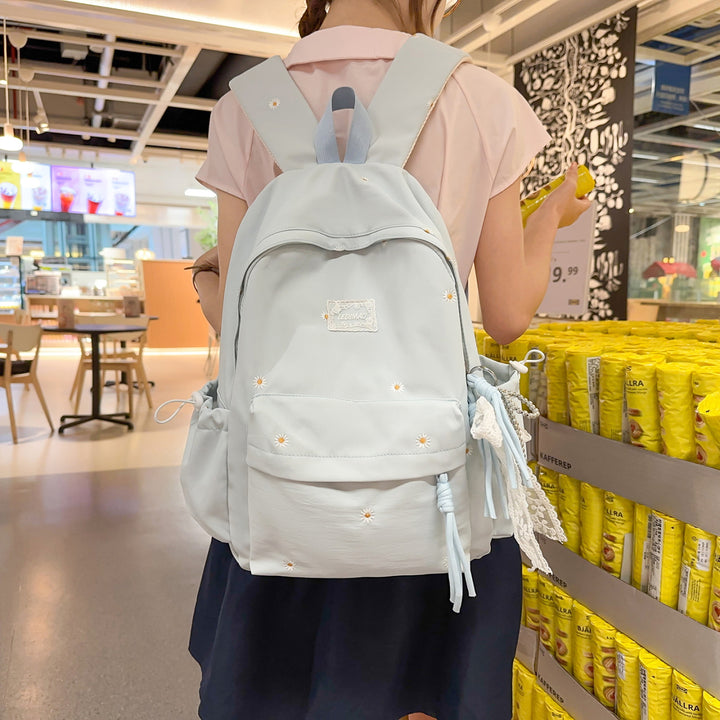Stylischer backpack mit floralem Schmuck Karnz