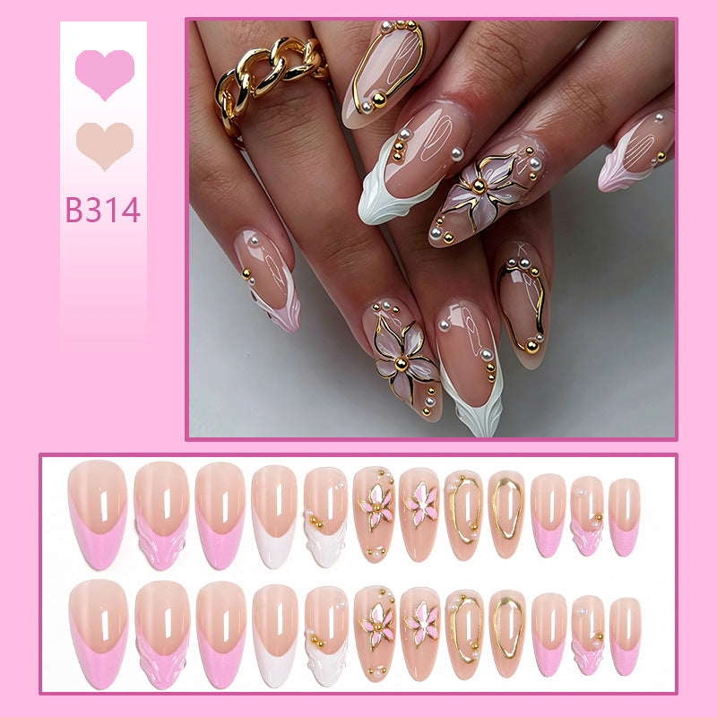 Kunstnagelset mit eleganten floralen Designs und Glamourösen 3D-Applikationen Karnz