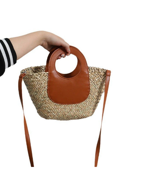 Damen Handtasche aus geflochtenem Material mit Lederdetails Karnz