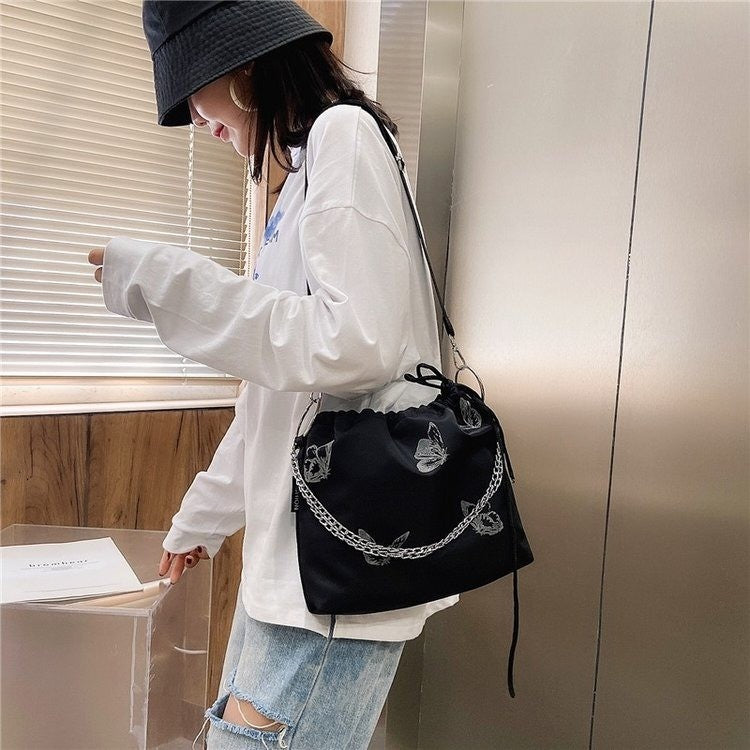 Elegante Drawstring Schmetterlingsdruck Handtasche