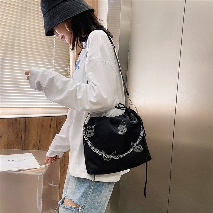 Elegante Drawstring Schmetterlingsdruck Handtasche