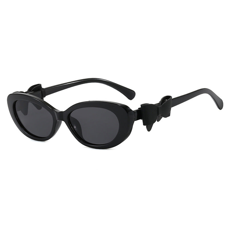 Damen modische Sonnenbrille mit verspieltem Schleifen-Design Karnz