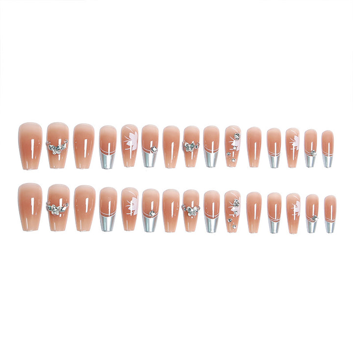 Kunstnagelset mit glamourösen Blüten- und Glitzerverzierungen Karnz