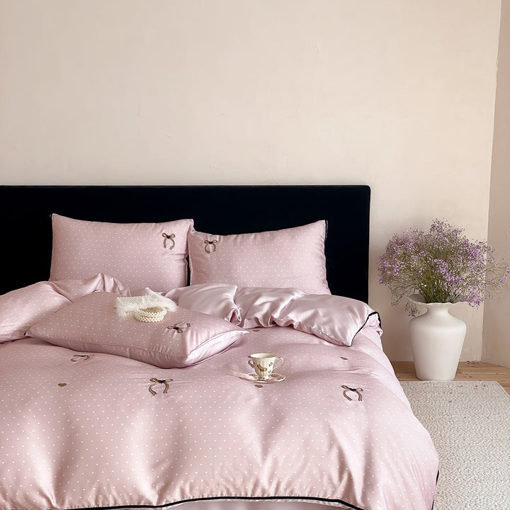 Luxuriöses Satin-Bettwäsche-Set mit zarten Pünktchen und Schleifenstickerei