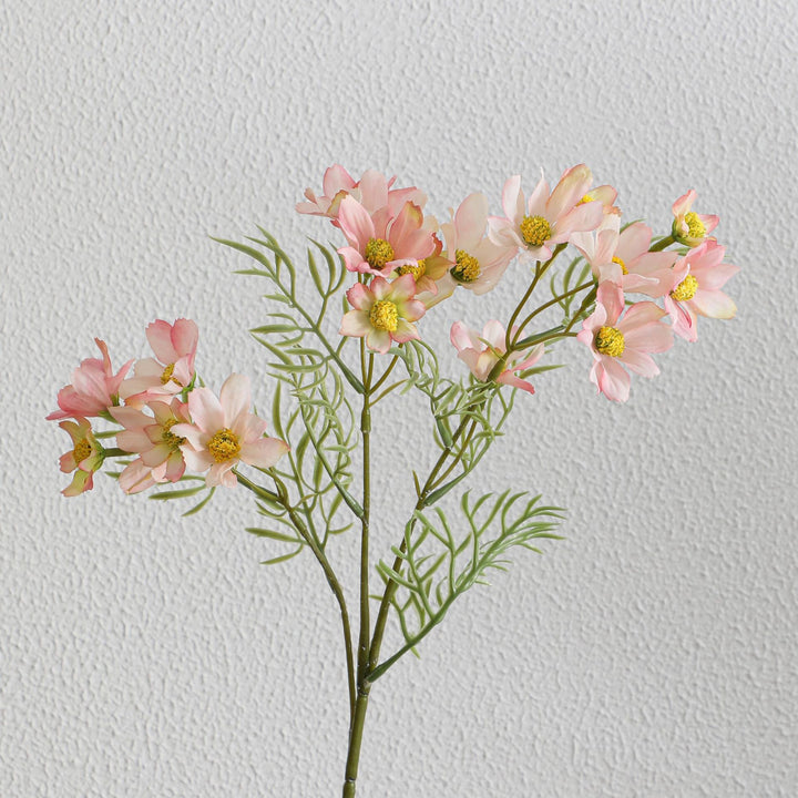Künstlicher Blütenzweig mit leuchtenden pinken Blumen Karnz