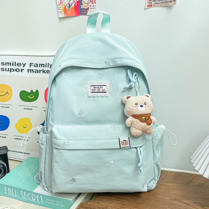 Stylischer backpack mit floralem Schmuck Karnz