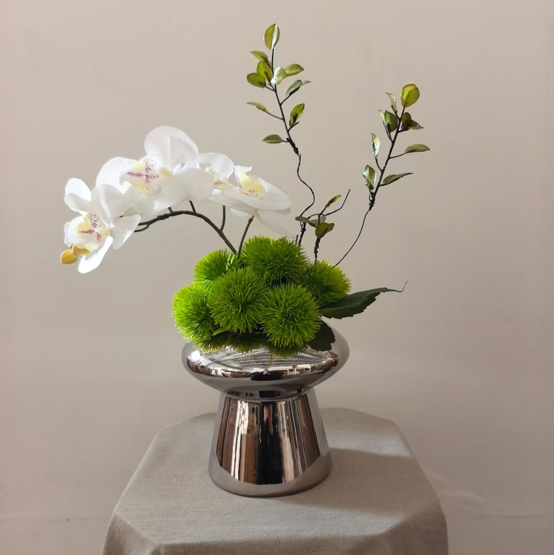 Elegante dekorative Orchideenarrangement