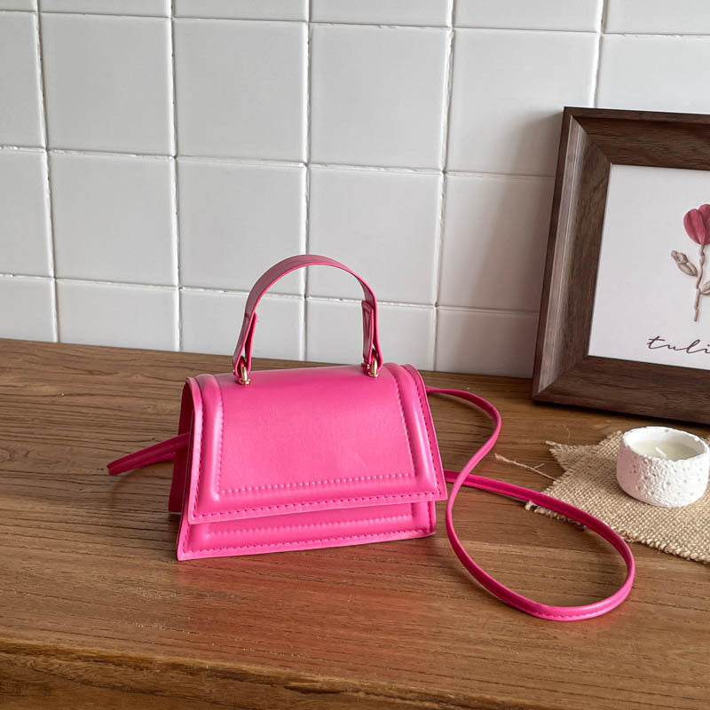 Strukturierte Mini-Crossbody-Handtasche