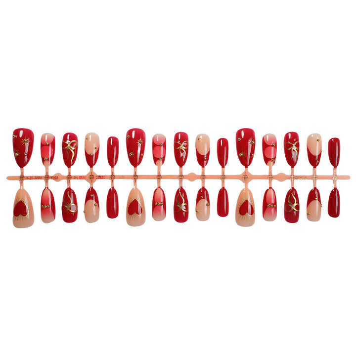 Dekorativer Press-On-Nagelset mit eleganten Herz- und Blumendesigns Karnz