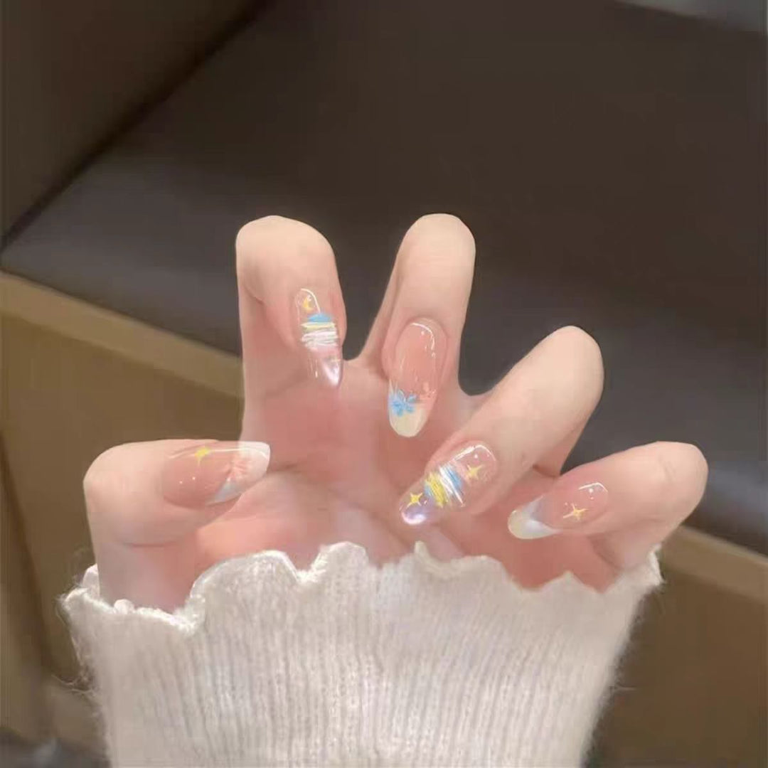 Künstlerisches Press-On Nagelset mit Sternmotiven Karnz