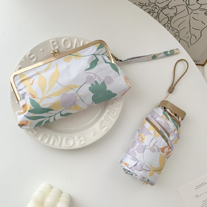 Damen eleganter Faltregenschirm mit floralem Design und praktischem Etui Karnz
