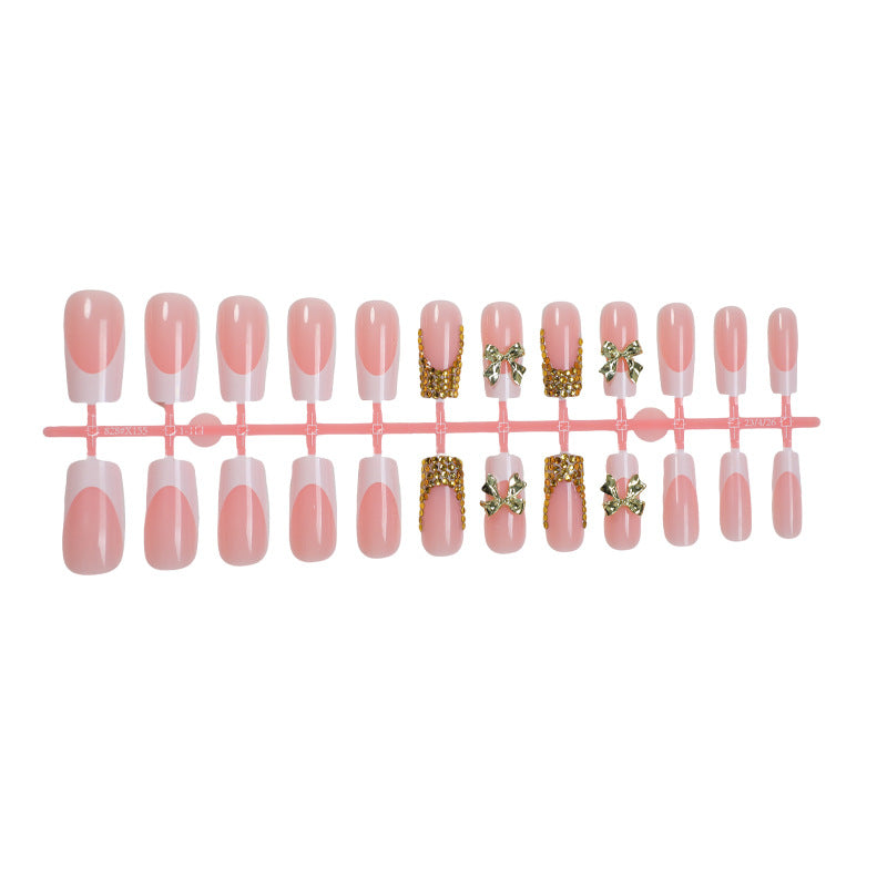 Dekoratives Press-On Nail Art Set mit elegantem Bogen und Edelstein-Akzenten Karnz
