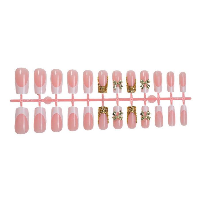 Dekoratives Press-On Nail Art Set mit elegantem Bogen und Edelstein-Akzenten Karnz