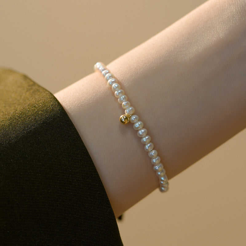 Perlenarmband mit Feinem Goldakzent Karnz