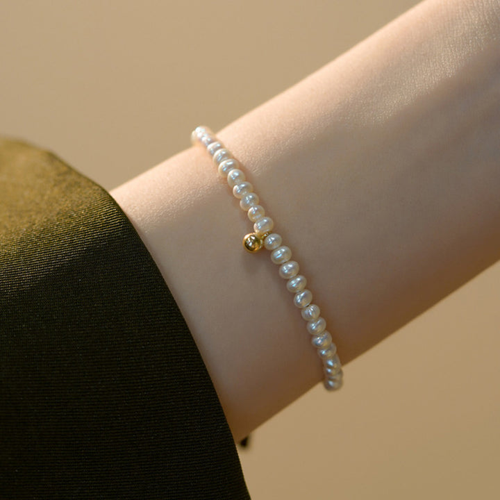 Perlenarmband mit Feinem Goldakzent Karnz