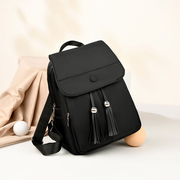 Stylischer Rucksack mit Quasten Karnz