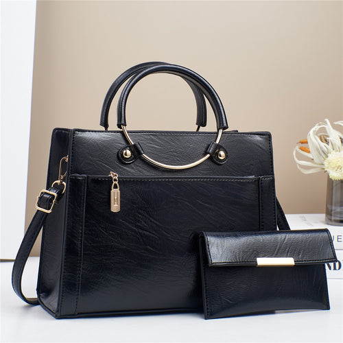 Elegante Handtasche mit Abnehmbaren Schulterriemen und Passendem Geldbeutel Karnz