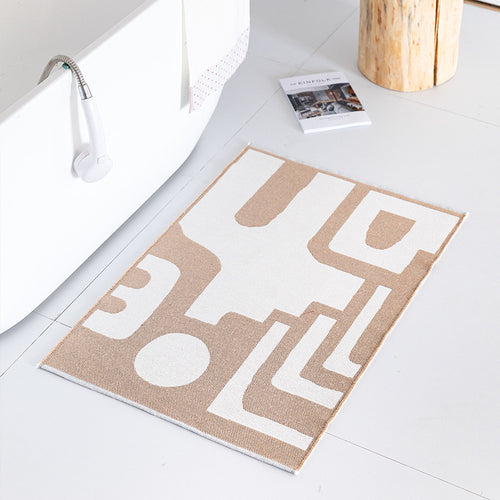Flachgewebte Badematte mit abstraktem Geometriemuster Karnz