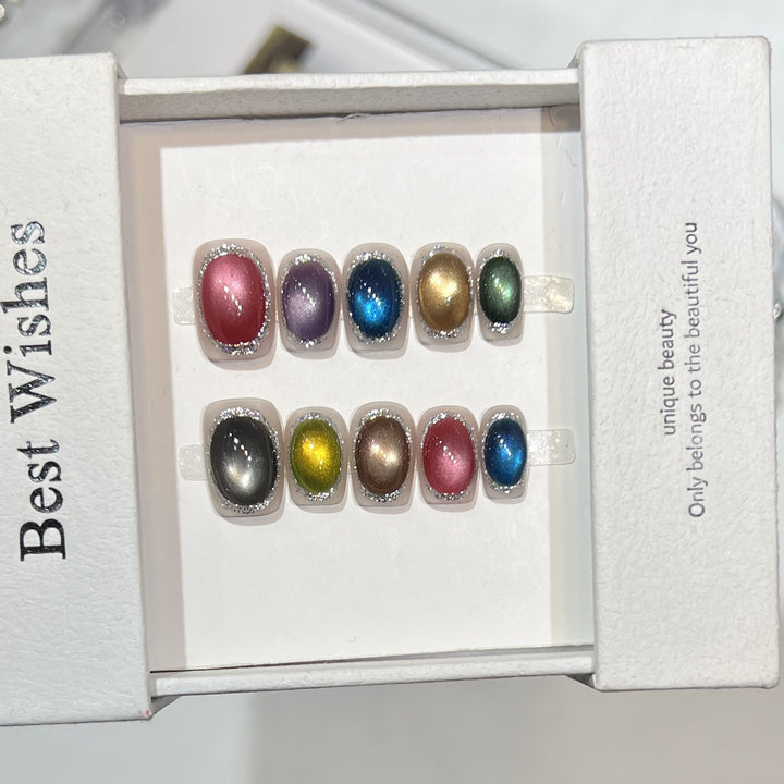 Bunte metallische Press-On Nagelset mit glitzernden Akzenten Karnz